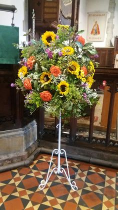 Pedestal with oranges and yellows Leicestershire wedding